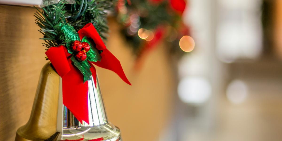 Holiday bell and greens